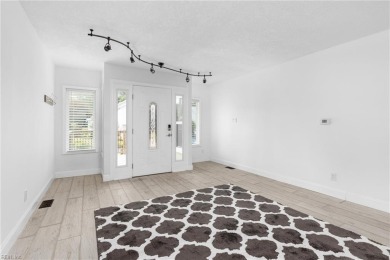 Unique 4BR/3.5BA home in Birdneck Lake adorned with front and on Red Wing Lake Golf Course in Virginia - for sale on GolfHomes.com, golf home, golf lot