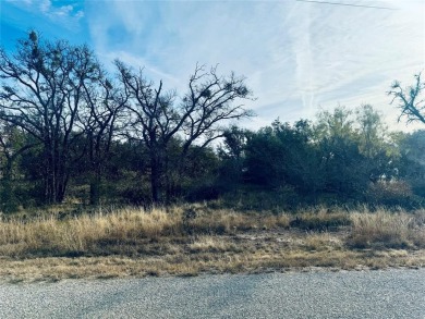 This 0.56-acre lot, located just outside the Hideout Golf Course on Hideout Golf Club and Resort  in Texas - for sale on GolfHomes.com, golf home, golf lot