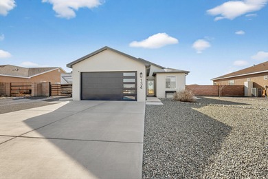 Enjoy the golf course community in this almost new home modern on Tierra Del Sol Golf Course in New Mexico - for sale on GolfHomes.com, golf home, golf lot