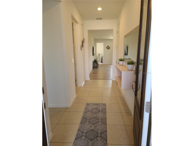 Discover this beautifully maintained, nearly new, 2-bedroom home on Trilogy at Ocala Preserve in Florida - for sale on GolfHomes.com, golf home, golf lot