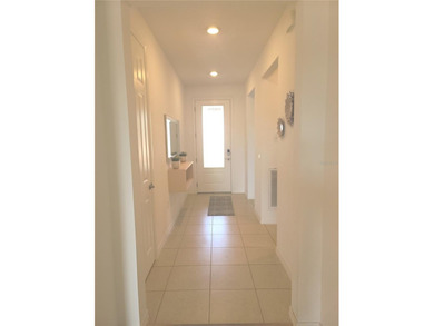 Discover this beautifully maintained, nearly new, 2-bedroom home on Trilogy at Ocala Preserve in Florida - for sale on GolfHomes.com, golf home, golf lot