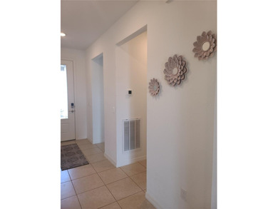 Discover this beautifully maintained, nearly new, 2-bedroom home on Trilogy at Ocala Preserve in Florida - for sale on GolfHomes.com, golf home, golf lot