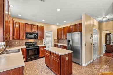 SELLERS HAVE PRICED THIS HOME TO REFLECT NEEDED UPDATES-your on Northstone Country Club in North Carolina - for sale on GolfHomes.com, golf home, golf lot