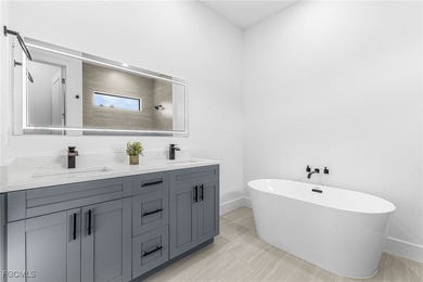 OWNER WANTS OFFERS! WOW! BRAND NEW WATERFRONT HOME with 3 on Burnt Store Golf Club in Florida - for sale on GolfHomes.com, golf home, golf lot