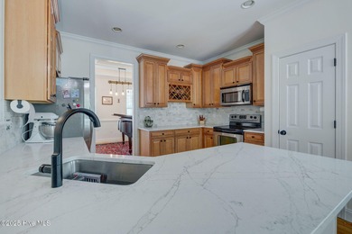 Welcome to this beautifully maintained 4-bedroom, 2.5-bathroom on Belvedere Country Club in North Carolina - for sale on GolfHomes.com, golf home, golf lot