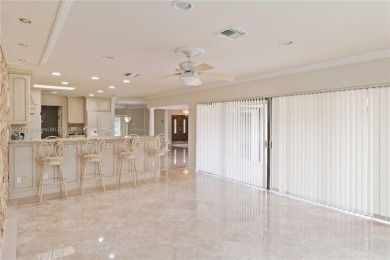 Spacious property directly on the Golf Course with beautiful on The Country Club At Boca Raton in Florida - for sale on GolfHomes.com, golf home, golf lot