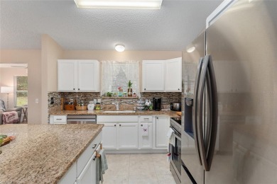 NO BOND! EXPANDED 3/2 AMARILLO with GOLF CART GARAGE located in on The Links of Spruce Creek in Florida - for sale on GolfHomes.com, golf home, golf lot