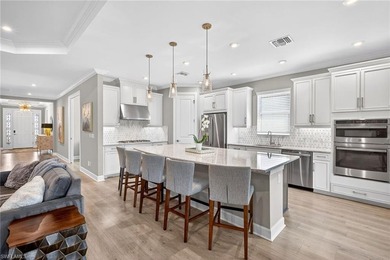 Experience luxury living in this rare 4-bedroom, 3-bath + den on Esplanade Golf and  Country Club in Florida - for sale on GolfHomes.com, golf home, golf lot