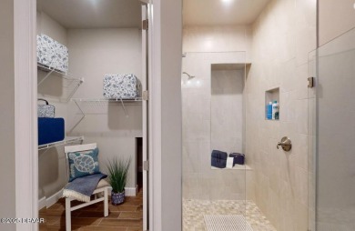 BRAND NEW PHASE! The Blossom II is a two-story townhome with 3 on Plantation Bay Golf and Country Club in Florida - for sale on GolfHomes.com, golf home, golf lot