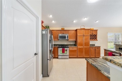 STUNNING WATER VIEW | LILY MODEL | 3 BEDROOMS | 2-CAR + GOLF on Pennbrooke Fairways in Florida - for sale on GolfHomes.com, golf home, golf lot