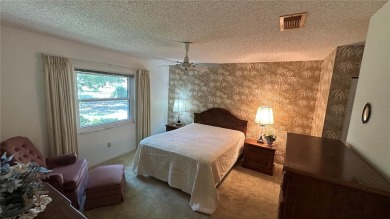 Great Twintree model available right now for move in. Located on on Caloosa Greens Executive Golf Course in Florida - for sale on GolfHomes.com, golf home, golf lot