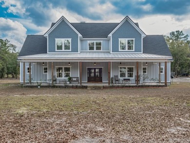 Stunning 5,100 sq ft home with located right across from the on Wildwood Country Club in Florida - for sale on GolfHomes.com, golf home, golf lot