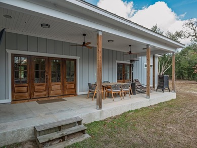 Stunning 5,100 sq ft home with located right across from the on Wildwood Country Club in Florida - for sale on GolfHomes.com, golf home, golf lot