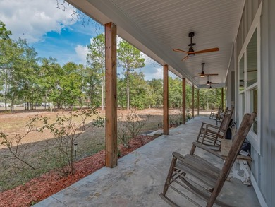 Stunning 5,100 sq ft home with located right across from the on Wildwood Country Club in Florida - for sale on GolfHomes.com, golf home, golf lot