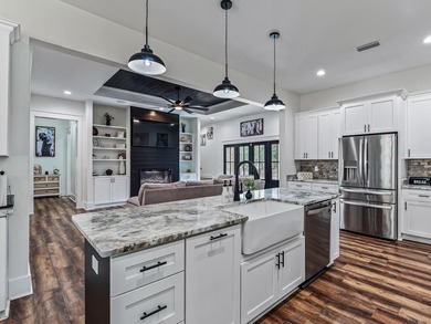 Stunning 5,100 sq ft home with located right across from the on Wildwood Country Club in Florida - for sale on GolfHomes.com, golf home, golf lot