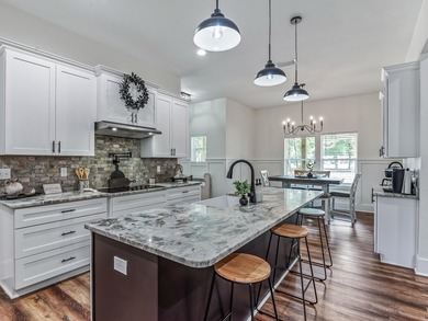 Stunning 5,100 sq ft home with located right across from the on Wildwood Country Club in Florida - for sale on GolfHomes.com, golf home, golf lot