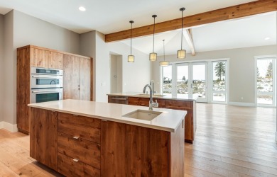 Stunning single level end-unit townhome perched on a natural on Tetherow Golf Club in Oregon - for sale on GolfHomes.com, golf home, golf lot