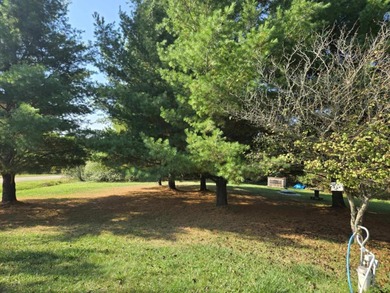 Don't miss this spacious double lot offering in central Sugar on Sugar Springs Country Club in Michigan - for sale on GolfHomes.com, golf home, golf lot