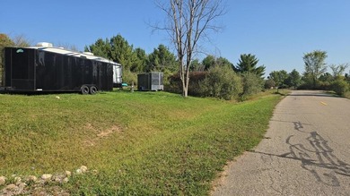 Don't miss this spacious double lot offering in central Sugar on Sugar Springs Country Club in Michigan - for sale on GolfHomes.com, golf home, golf lot