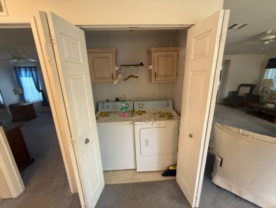 This well loved 2-bedroom, 2-bathroom Palm Harbor home is being on Del Tura Golf and Country Club in Florida - for sale on GolfHomes.com, golf home, golf lot