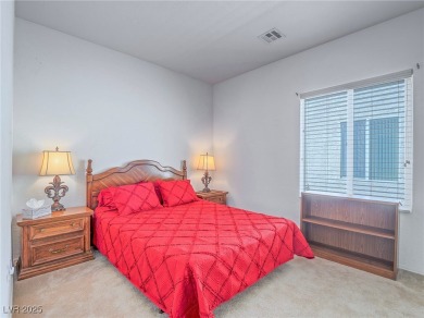 From the moment you enter the gated courtyard, you're greeted on Aliante Golf Club in Nevada - for sale on GolfHomes.com, golf home, golf lot