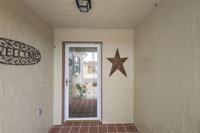 RARE FIND! 1/1 BLOCK AND STUCCO Courtyard Villa with a OVERSIZED on El Diablo Executive Golf Course in Florida - for sale on GolfHomes.com, golf home, golf lot