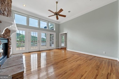Experience refined lakefront living at its finest at 1390 Winged on Harbor Club Golf and Country Club in Georgia - for sale on GolfHomes.com, golf home, golf lot