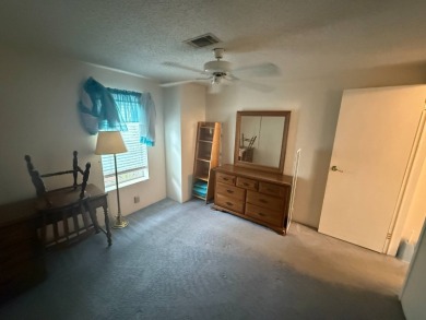 This well loved 2-bedroom, 2-bathroom Palm Harbor home is being on Del Tura Golf and Country Club in Florida - for sale on GolfHomes.com, golf home, golf lot