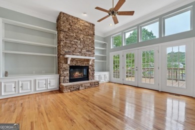 Experience refined lakefront living at its finest at 1390 Winged on Harbor Club Golf and Country Club in Georgia - for sale on GolfHomes.com, golf home, golf lot