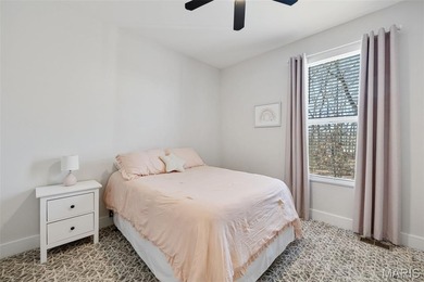 Why go on vacation when you can live at Raintree? This on Raintree Country Club in Missouri - for sale on GolfHomes.com, golf home, golf lot