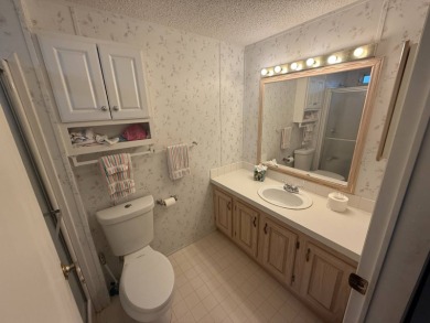 This well loved 2-bedroom, 2-bathroom Palm Harbor home is being on Del Tura Golf and Country Club in Florida - for sale on GolfHomes.com, golf home, golf lot