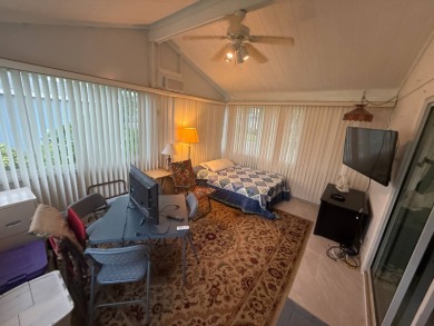 This well loved 2-bedroom, 2-bathroom Palm Harbor home is being on Del Tura Golf and Country Club in Florida - for sale on GolfHomes.com, golf home, golf lot