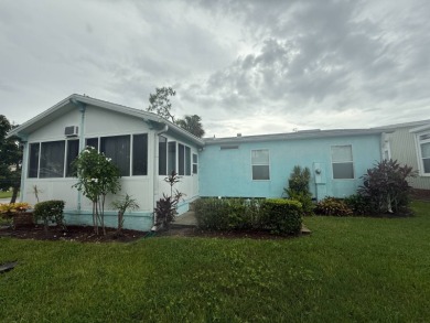 This well loved 2-bedroom, 2-bathroom Palm Harbor home is being on Del Tura Golf and Country Club in Florida - for sale on GolfHomes.com, golf home, golf lot