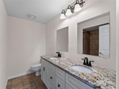 Stunning Remodeled 4-Bedroom Home on 1.4 Acres with Pool, Pond on The River Club in Florida - for sale on GolfHomes.com, golf home, golf lot