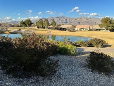 This single-story home in Sun City Aliante boasts stunning golf on Aliante Golf Club in Nevada - for sale on GolfHomes.com, golf home, golf lot
