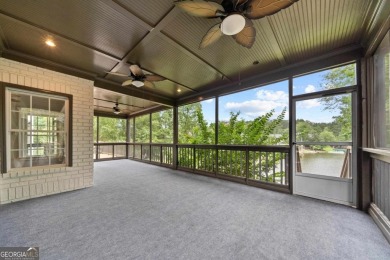 Experience refined lakefront living at its finest at 1390 Winged on Harbor Club Golf and Country Club in Georgia - for sale on GolfHomes.com, golf home, golf lot