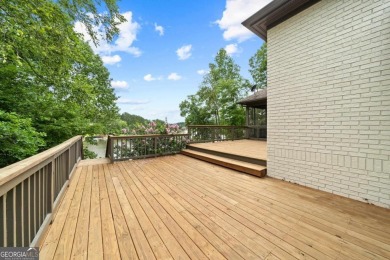 Experience refined lakefront living at its finest at 1390 Winged on Harbor Club Golf and Country Club in Georgia - for sale on GolfHomes.com, golf home, golf lot