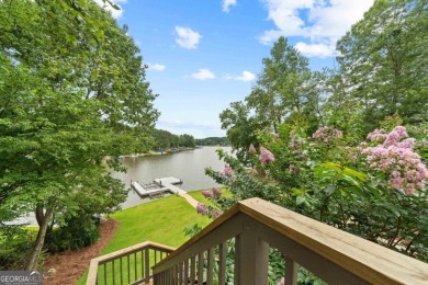 Experience refined lakefront living at its finest at 1390 Winged on Harbor Club Golf and Country Club in Georgia - for sale on GolfHomes.com, golf home, golf lot