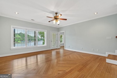 Experience refined lakefront living at its finest at 1390 Winged on Harbor Club Golf and Country Club in Georgia - for sale on GolfHomes.com, golf home, golf lot