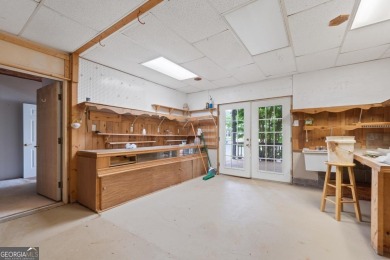 Experience refined lakefront living at its finest at 1390 Winged on Harbor Club Golf and Country Club in Georgia - for sale on GolfHomes.com, golf home, golf lot