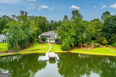 Experience refined lakefront living at its finest at 1390 Winged on Harbor Club Golf and Country Club in Georgia - for sale on GolfHomes.com, golf home, golf lot