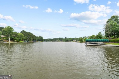Experience refined lakefront living at its finest at 1390 Winged on Harbor Club Golf and Country Club in Georgia - for sale on GolfHomes.com, golf home, golf lot
