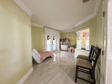 This beautifully updated home truly stands out in Sun 'n Lake! on Sun n Lake Golf and Country Club in Florida - for sale on GolfHomes.com, golf home, golf lot