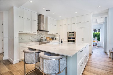 Rarely available two-story pool home with garage in gated on Turnberry Isle Resort and Club in Florida - for sale on GolfHomes.com, golf home, golf lot