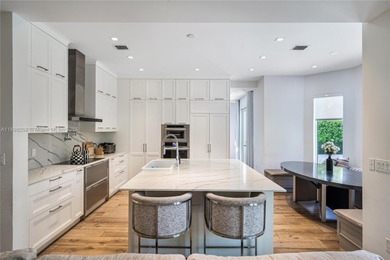 Rarely available two-story pool home with garage in gated on Turnberry Isle Resort and Club in Florida - for sale on GolfHomes.com, golf home, golf lot