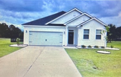 Gated Golf Community home has 3 bedrooms with 2 full baths on Players Course At Wyboo Plantation in South Carolina - for sale on GolfHomes.com, golf home, golf lot