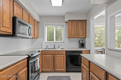 Discover this beautifully renovated, fully furnished end unit on Oak Island Golf Club in North Carolina - for sale on GolfHomes.com, golf home, golf lot