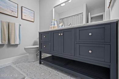 Discover this beautifully renovated, fully furnished end unit on Oak Island Golf Club in North Carolina - for sale on GolfHomes.com, golf home, golf lot