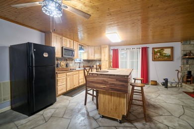 RIVERFRONT HOME located on South Fork River! Many updates on Cherokee Village North Course in Arkansas - for sale on GolfHomes.com, golf home, golf lot