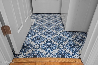 Discover this beautifully renovated, fully furnished end unit on Oak Island Golf Club in North Carolina - for sale on GolfHomes.com, golf home, golf lot